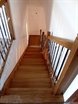 Dřevěné schodiště se zábradlím kombinace dřevo - ocel